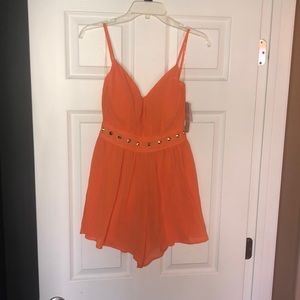 Orange studded romper